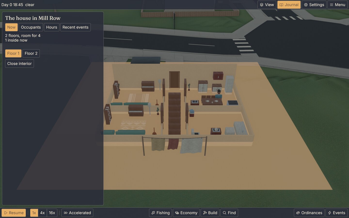 Looking inside a townhouse at dinner time: the ground floor opened up with sofa, piano, stairs and a resident at the kitchen table