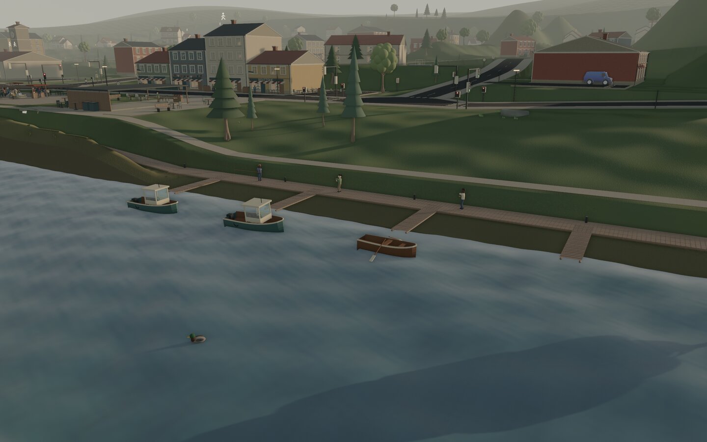 The quay at five in the afternoon: two fishing boats and a rowboat moored, anglers on the jetty, a duck, and the town behind
